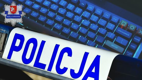Klawiatura, galeryjka z napisem &quot;POLICJA&quot;, logo Komendy Powiatowej Policji w Lubaczowie.