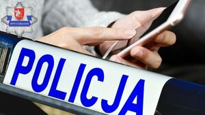 Napis policja, logo KPP Lubaczów o telefon komórkowy.